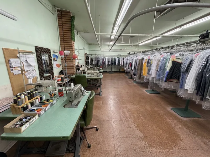 The in-house alterations station with sewing machines and thread