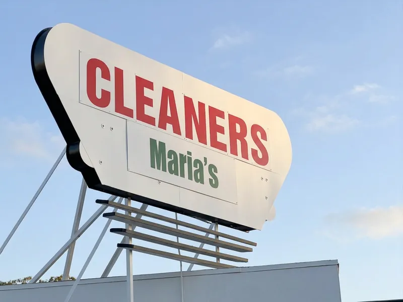 The retro rooftop sign reading Cleaners, Maria's
